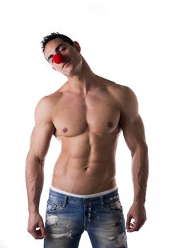 Small Red Ball on Sexy Shirtless Muscular Young Hot Man Nose. Isolated on White Background. Usually Red Ball on Nose are Used by Clowns.