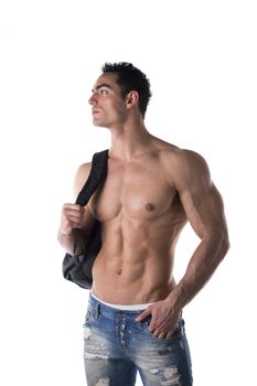 Shirtless muscular young man with backpack on his back, looking away, isolated on white