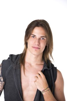 Beautiful young long haired man in jacket smiling, posing isolated on white