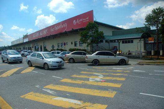 KLCCT, Malaysia - June 7, 2013: Road traffic at Kuala Lumpur Low Cost Carrier Terminal (KLCCT), Malaysia.