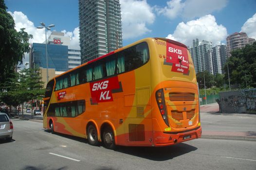 Kuala Lumpur, Malaysia - June 8, 2013: Road traffic at Kuala Lumpur city, Malaysia.