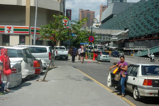 Kuala Lumpur, Malaysia - June 8, 2013: Road traffic at Kuala Lumpur city, Malaysia.