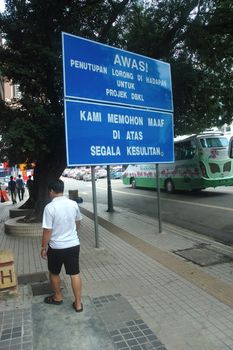 Kuala Lumpur, Malaysia - June 8, 2013: Road traffic at Kuala Lumpur city, Malaysia.