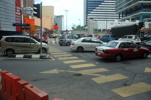 Kuala Lumpur, Malaysia - June 8, 2013: Road traffic at Kuala Lumpur city, Malaysia.