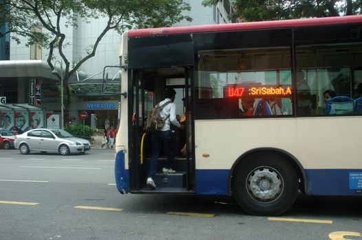 Kuala Lumpur, Malaysia - June 8, 2013: Road traffic at Kuala Lumpur city, Malaysia.