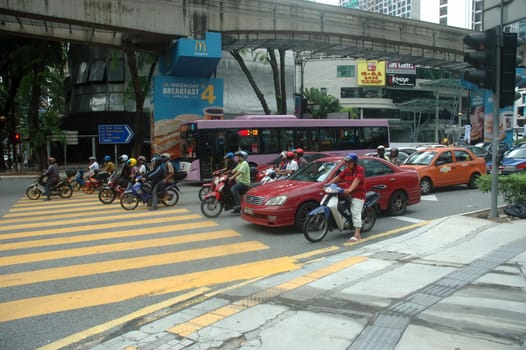 Kuala Lumpur, Malaysia - June 8, 2013: Road traffic at Kuala Lumpur city, Malaysia.