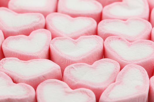 Heart shape pink marshmallow background