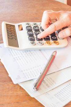 Businesswoman checking account balance, stock photo