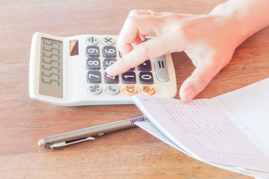 Businesswoman calculated account balance, stock photo