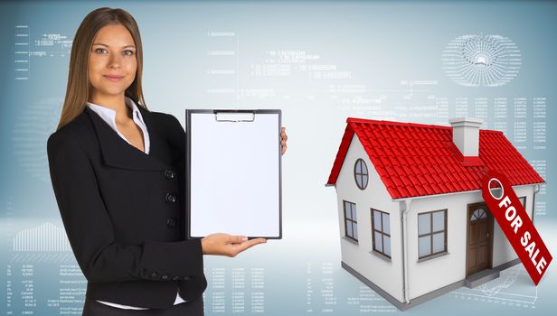 Businesswoman hold paper holder. Small house with a label for the sale