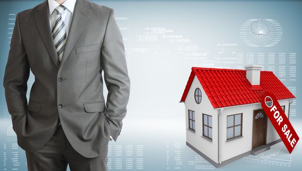 Businessman in suit. Small house with a label for the sale