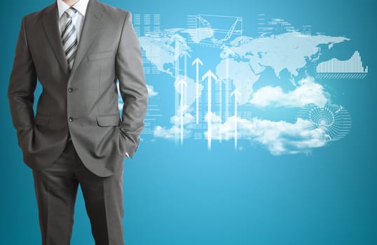 Businessman in suit. World map, clouds, and graphs as backdrop