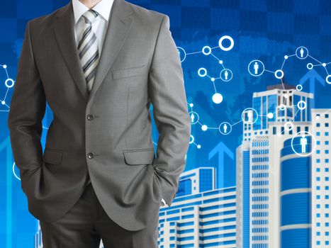 Businessman in a suit. Skyscrapers with network, world map and arrows as backdrop