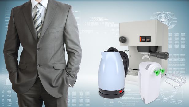 Business man in suit. Coffee machine, kettle and blender