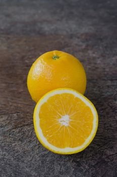 fresh  orange  fruits on wooden background