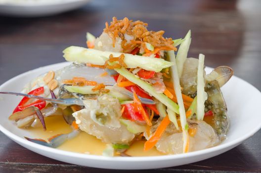 close up spicy mango salad with  crab , asian style food
