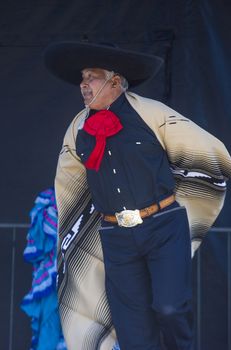 SAN DIEGO - MAY 03 : Dancer Participates at the Cinco De Mayo festival in San Diego CA . on May 3, 2014. Cinco De Mayo Celebrates Mexico's victory over the French on May 5, 1862.