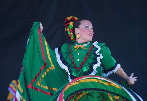 SAN DIEGO - MAY 03 : Dancer Participates at the Cinco De Mayo festival in San Diego CA . on May 3, 2014. Cinco De Mayo Celebrates Mexico's victory over the French on May 5, 1862.