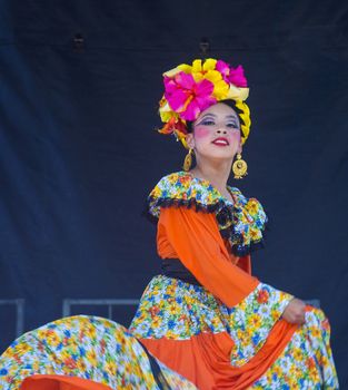 SAN DIEGO - MAY 03 : Dancer Participates at the Cinco De Mayo festival in San Diego CA . on May 3, 2014. Cinco De Mayo Celebrates Mexico's victory over the French on May 5, 1862.