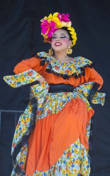 SAN DIEGO - MAY 03 : Dancer Participates at the Cinco De Mayo festival in San Diego CA . on May 3, 2014. Cinco De Mayo Celebrates Mexico's victory over the French on May 5, 1862.