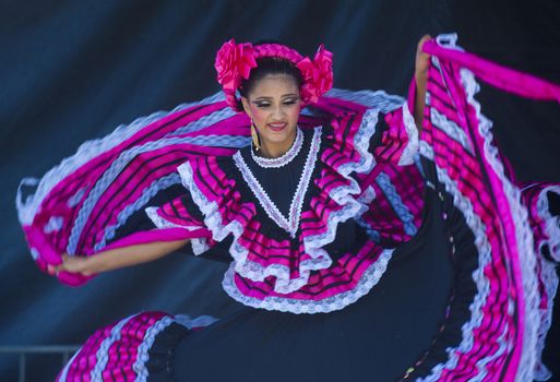 SAN DIEGO - MAY 03 : Dancer Participates at the Cinco De Mayo festival in San Diego CA . on May 3, 2014. Cinco De Mayo Celebrates Mexico's victory over the French on May 5, 1862.