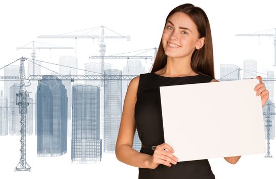 Businesswoman holding paper sheet. Wire frame tower crane and skyscrapers as backdrop