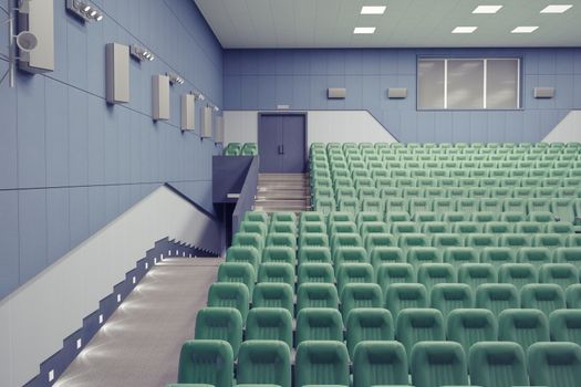 empty green armchairs in modern theater Hall
