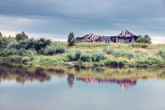 abandoned house near the water