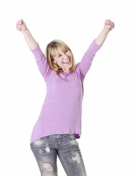 young blond woman cheering with two fists
