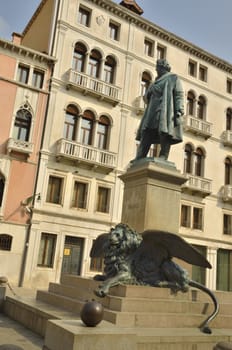 Memorial sculpture to Manin and lion of St. Mark, the traditional symbol of Venice, in Piazza Manin, Venice, Italy
