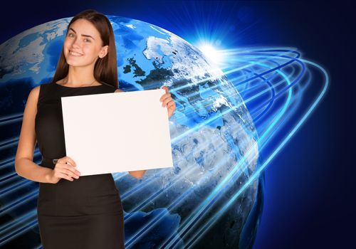 Businesswoman holding paper sheet. Glowing lines and Earth as backdrop. Elements of this image are furnished by NASA