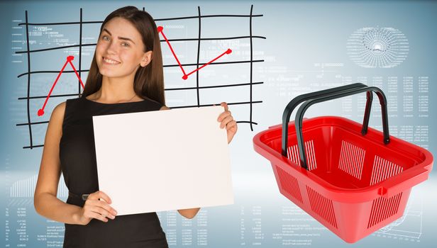 Businesswoman hold white paper. Shopping basket with graph of price changes as backdrop