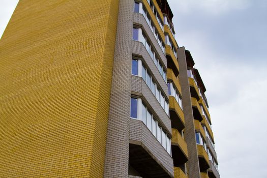 High rise construction. Brick houses under construction