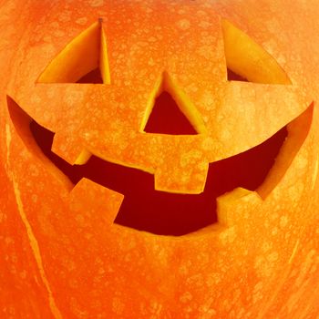 Funny Jack O Lantern halloween pumpkin close-up background