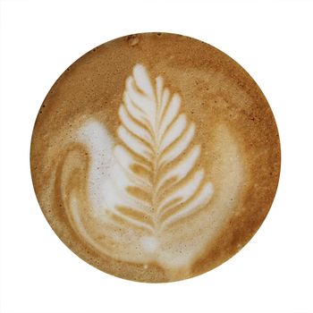 Closeup up of coffee latte foam with leaf design art isolated on a white background, viewed from top.