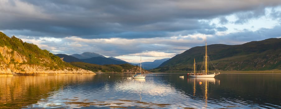 Panorama - Sailboats in a Scottish loch, evening sun