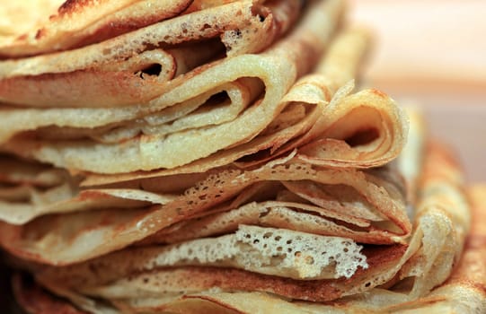 Close up of a pancakes pile with copy-space on the top