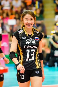 BANGKOK - AUGUST 17: Nootsara Tomkom of Thailand Volleyball Team in action during The Volleyball World Grand Prix 2014 at Indoor Stadium Huamark on August 17, 2014 in Bangkok, Thailand.