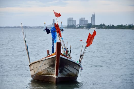 Fishing boat floating in a sea, BangPra, Chonburi, Thailand