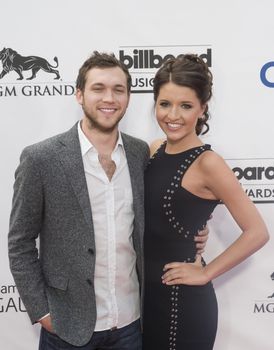 LAS VEGAS - MAY 18 :  Singer/songwriter Phillip Phillips (L) and Hannah Blackwell attend the 2014 Billboard Music Awards at the MGM Grand Garden Arena on May 18 , 2014 in Las Vegas.