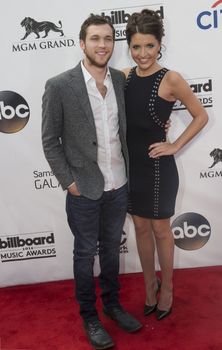 LAS VEGAS - MAY 18 :  Singer/songwriter Phillip Phillips (L) and Hannah Blackwell attend the 2014 Billboard Music Awards at the MGM Grand Garden Arena on May 18 , 2014 in Las Vegas.