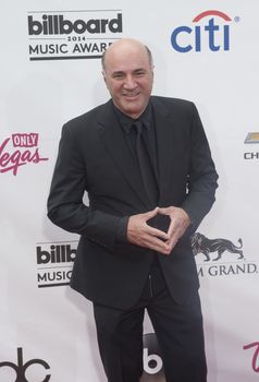 LAS VEGAS - MAY 18 : Canadian businessman and TV personality Kevin O'Leary attend the 2014 Billboard Music Awards at the MGM Grand Garden Arena on May 18 , 2014 in Las Vegas.