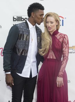 LAS VEGAS - MAY 18 : Recording artist Iggy Azalea (L) and NBA player Nick Young attend the 2014 Billboard Music Awards at the MGM Grand Garden Arena on May 18 , 2014 in Las Vegas.