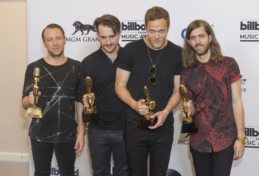 LAS VEGAS - MAY 18 : Members of the alternative rock band Imagine Dragons attend the 2014 Billboard Music Awards press room at the MGM Grand Garden Arena on May 18 , 2014 in Las Vegas. 