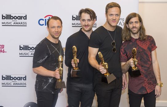 LAS VEGAS - MAY 18 : Members of the alternative rock band Imagine Dragons attend the 2014 Billboard Music Awards press room at the MGM Grand Garden Arena on May 18 , 2014 in Las Vegas. 