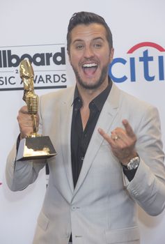 LAS VEGAS - MAY 18 : Recording artist Luke Bryan attends the 2014 Billboard Music Awards press room at the MGM Grand Garden Arena on May 18 , 2014 in Las Vegas.