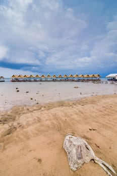 Wood cottage Water and sky in  the Reservoir embankment Sirinthorn Ubonratchatani Thailand