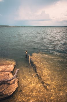 Water and sky in  the Reservoir embankment Sirinthorn Ubonratchatani Thailand vintage