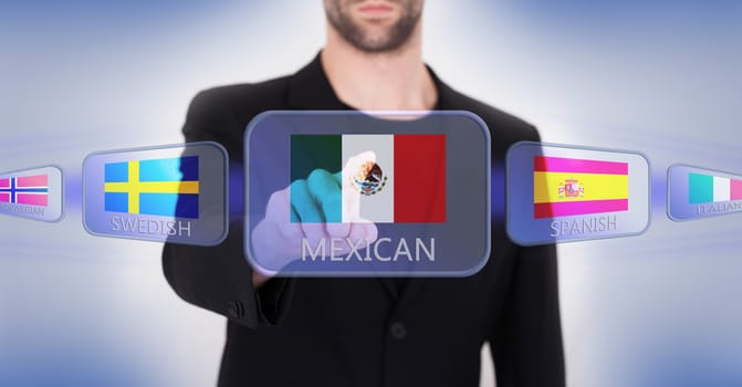 Hand pushing on a touch screen interface, choosing language or country, Mexico