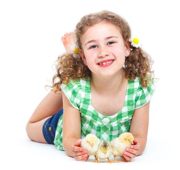 Happy little girl holding baby chickens - isolated white background